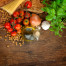 Fresh ingredients for italian cuisine: pasta, tomatoes, basil, olive oil, garlic and onion